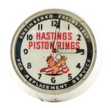 Hastings Piston Rings Light Up Glass Face Clock.