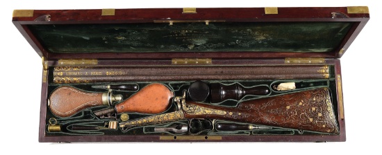 (A) MAGNIFICENT CASED GOLD ENCRUSTED DUAL IGNITION SHOTGUN BY THOMAS, PASAGE DELORME, PARIS, GUNMAKE