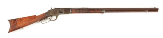 (A) DOCUMENTED RARE SPECIAL ORDER WINCHESTER FIRST MODEL 1873 DELUXE WITH 28" BARREL.