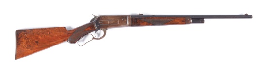 (C) DELUXE WINCHESTER MODEL 1886 LEVER ACTION RIFLE.