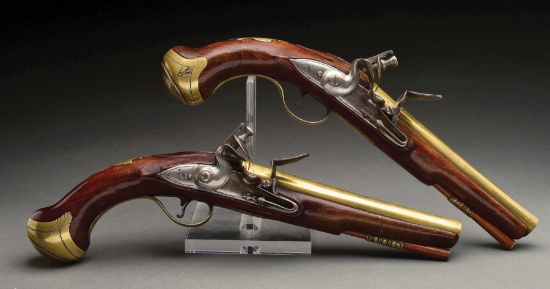 (A) Brace of Brass Barreled English Flintlock Pistols by Joseph Buckmaster.