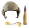 LOT OF 3: WORLD WAR II M-5 FLAK HELMET, SWORD HANGER, AND DUMMY ARTILLERY SHELL.