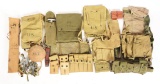 LARGE LOT OF 27: US WORLD WAR I AND WORLD WAR II MILITARY FIELD GEAR ITEMS.