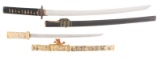 LOT OF TWO: WAKIZASHI AND BONE MOUNTED JAPANESE SWORD.