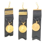 LOT OF 3: 14K GOLD WINCHESTER COMPANY MEDALS FOR SERVICE.