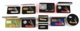 LOT OF 10: COMMEMORATIVE AND COLLECTOR'S KNIVES IN FACTORY TINS AND DISPLAY BOXES.
