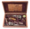 (A) CASED PAIR OF ENGRAVED COLT 1849 POCKET PERCUSSION REVOLVERS.