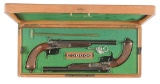 (A) CASED PAIR OF LE PAGE WAX BULLET DUELLING PISTOLS.