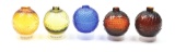 LOT OF FIVE: FIVE GLASS BOGARDUS TARGET BALLS, INCLUDING A RARE HOBNAIL.