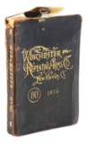 RARE 1916 WINCHESTER SALESMAN CATALOG WITH WINCHESTER SALESMAN ARTHUR PETRIE'S ID BADGE.