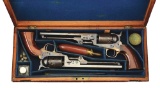 (A) STUNNING CASED PAIR OF COLT 1851 NAVY PERCUSSION REVOLVERS.
