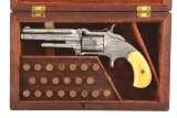 (A) CASED ENGRAVED SMITH & WESSON REVOLVER.