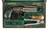(A) CASED BELGIAN MARIETTE TYPE PERCUSSION PEPPERBOX MARKED KITTRIDGE & CO.