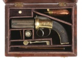 (A) UNUSUAL FOUR BARREL BRASS FRAME ENGLISH PERCUSSION PEPPERBOX IN ASSOCIATED WALNUT CASE.