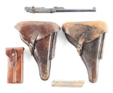 LOT OF FIVE: VARIOUS LUGER PARTS AND HOLSTERS.