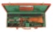(C) CASED KRIEGHOFF DRILLING GUN.