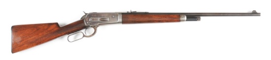 (C) WINCHESTER MODEL 1886 LEVER ACTION RIFLE.