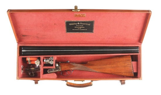 (M) WEBLEY AND SCOTT 700 12 GAUGE SIDE BY SIDE SHOTGUN IN LEATHER CASE WITH ACCESSORIES.