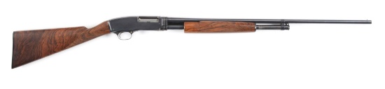 (C) WINCHESTER MODEL 42 SLIDE ACTION SHOTGUN.