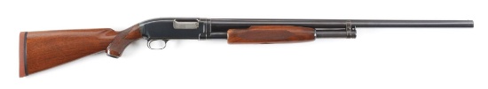 (C) WINCHESTER MODEL 12 HEAVY DUCK SHOTGUN.