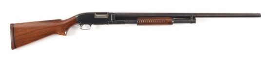 (C) WINCHESTER MODEL 12 HEAVY DUCK SHOTGUN.