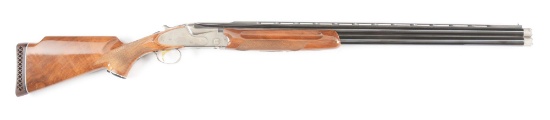 (M) SKB 885 12 GAUGE OVER/UNDER SHOTGUN WITH EXTRA TUBES.