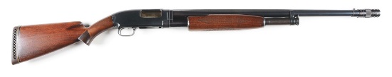(C) WINCHESTER MODEL 12 PUMP ACTION SHOTGUN.