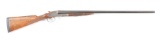 (C) L.C. SMITH GRADE 2E SIDE BY SIDE 12 GAUGE SHOTGUN.
