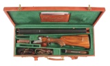 (C) CASED KRIEGHOFF DRILLING GUN.