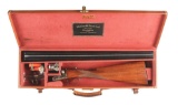 (M) WEBLEY AND SCOTT 700 12 GAUGE SIDE BY SIDE SHOTGUN IN LEATHER CASE WITH ACCESSORIES.