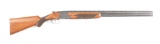 (C) BROWNING SUPERPOSED 12 GAUGE OVER/UNDER SHOTGUN.
