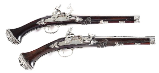 (A) SNAPHAUNCE PISTOLS WITH ORNATE MOUNTINGS IN THE STYLE OF 17TH CENTURY SWISS, EX. W.G. RENWICK.