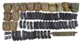 LARGE LOT OF AK MAGAZINES AND POUCHES.