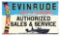 EVINRUDE OUTBOARD MOTORS AUTHORIZED SALES & SERVICE EMBOSSED TIN SIGN W/ BOAT GRAPHIC.