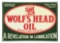 RARE WOLF'S HEAD MOTOR OIL EMBOSSED TIN SIGN W/ WOLF GRAPHIC.