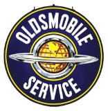 OUTSTANDING OLDSMOBILE SERVICE PORCELAIN SIGN W/ GLOBE GRAPHIC.