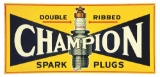 CHAMPION SPARK PLUGS EMBOSSED TIN SERVICE STATION SIGN W/ SPARK PLUG GRAPHIC.