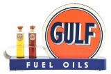 RARE GULF FUEL OILS TIN COUNTERTOP DISPLAY SIGN W/ GLASS SAMPLE OIL BOTTLES.