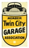 TWIN CITY GARAGE ASSOCIATION MEMBER TIN SIGN W/ CAR GRAPHIC.