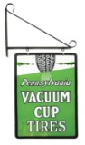 PENNSYLVANIA VACUUM CUP TIRES PORCELAIN SERVICE STATION SIGN W/ TIRE GRAPHIC & IRON HANGING BRACKET.