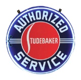STUDEBAKER AUTHORIZED SERVICE PORCELAIN SIGN W/ ADDED NEON.