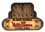 MCQUAY NORRIS LEAK PROOF PISTON RINGS LIGHT UP SERVICE STATION DISPLAY CLOCK.