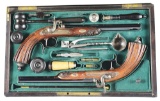 (A) AN ATTRACTIVE ENCASED PAIR OF LEPAGE TARGET PISTOLS WITH NUMEROUS ACCESSORIES.