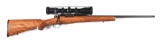 (M) DAKOTA ARMS MODEL 76 BOLT ACTION RIFLE WITH SWAROVSKI SCOPE.