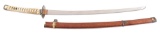 A SHINTO WAKAZASHI IN SAMURAI MOUNTS WITH PINE NEEDLE LACQUER.