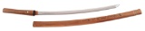 A GOOD SHINTO SURIAGE WAKIZASHI IN SHIRASAYA MOUNTS.