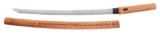 A SIGNED SHINTO WAKIZASHI WITH DRAGON HORIMONO IN SHIRASAYA MOUNTS.