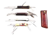 LOT OF 4: FOREIGN FOLDING KNIVES.