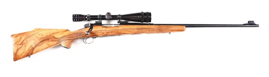 (M) WINCHESTER MODEL 70 BOLT ACTION RIFLE RECHAMBERED IN .300 WEATHERBY MAGNUM.