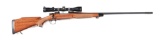 (M) REMINGTON MODEL 700 DELUXE ENHANCED RECIEVER BOLT ACTION RIFLE WITH SCOPE.